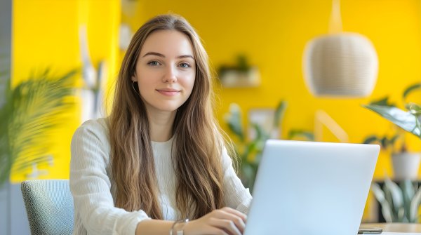 Stylish Caucasian Female Manager Sitting At Desk And Using 54880596 Medium
